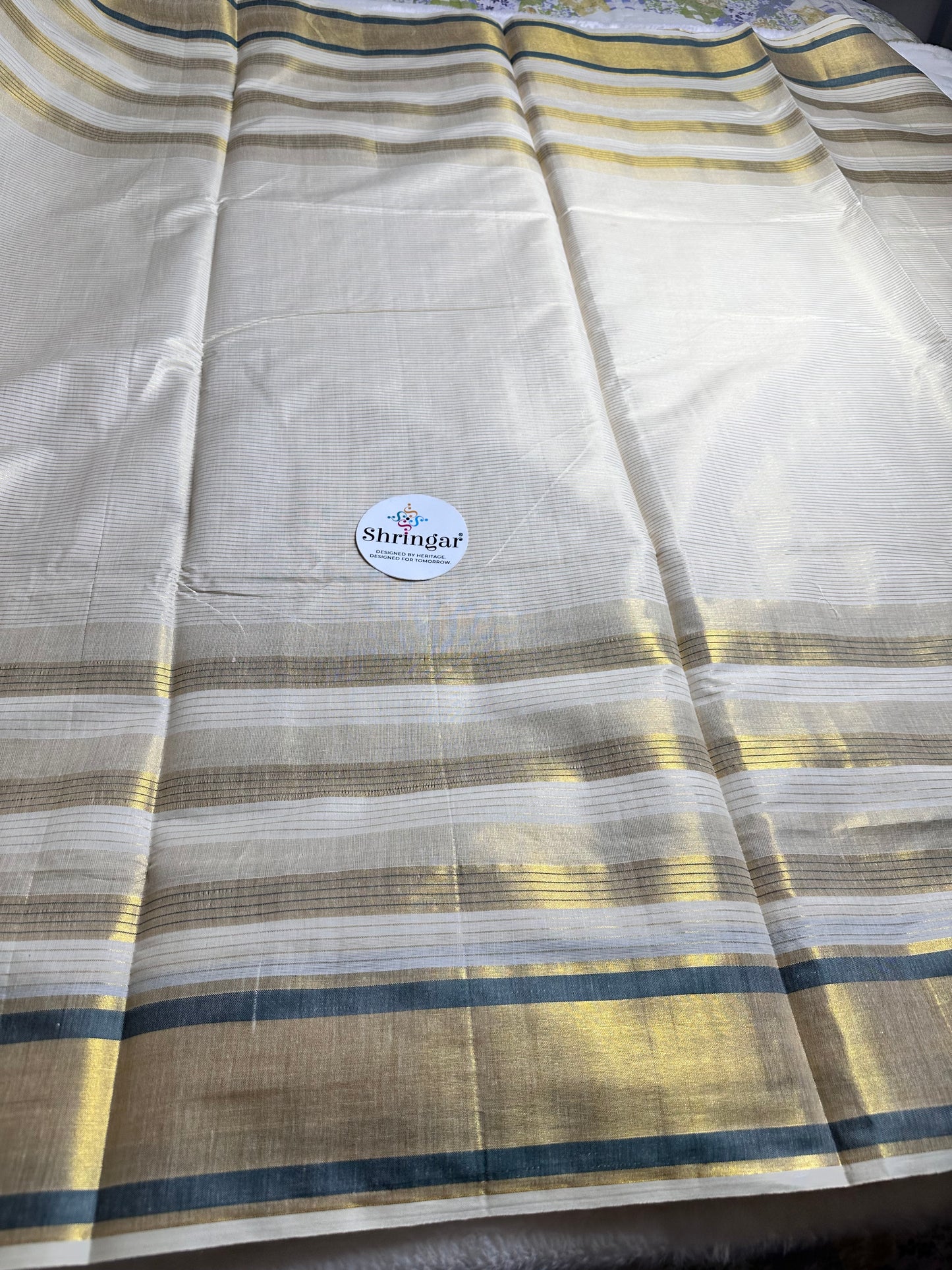 Kerala Saree with gold stripes