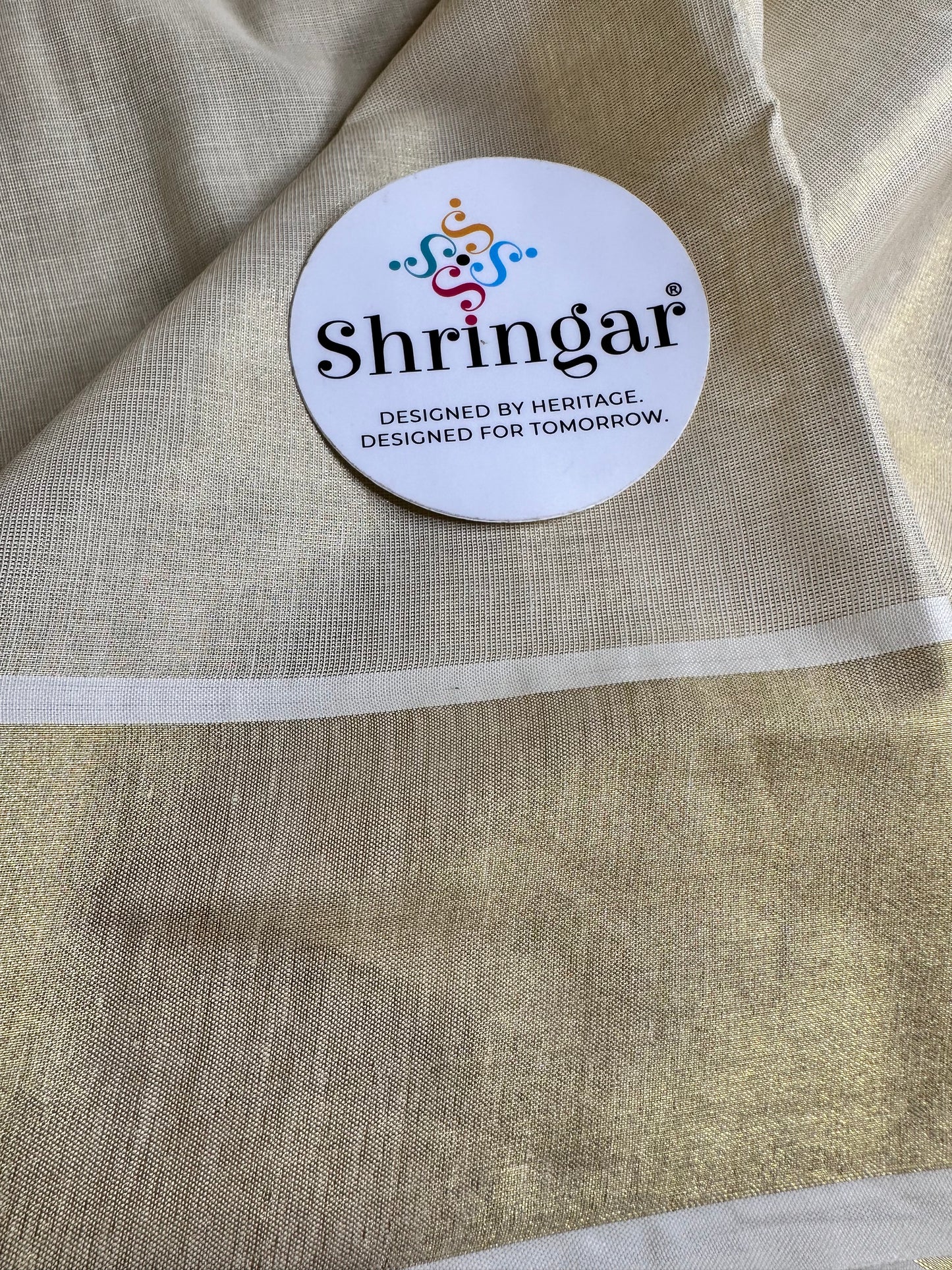 Kerala Saree with black and gold lotus motifs