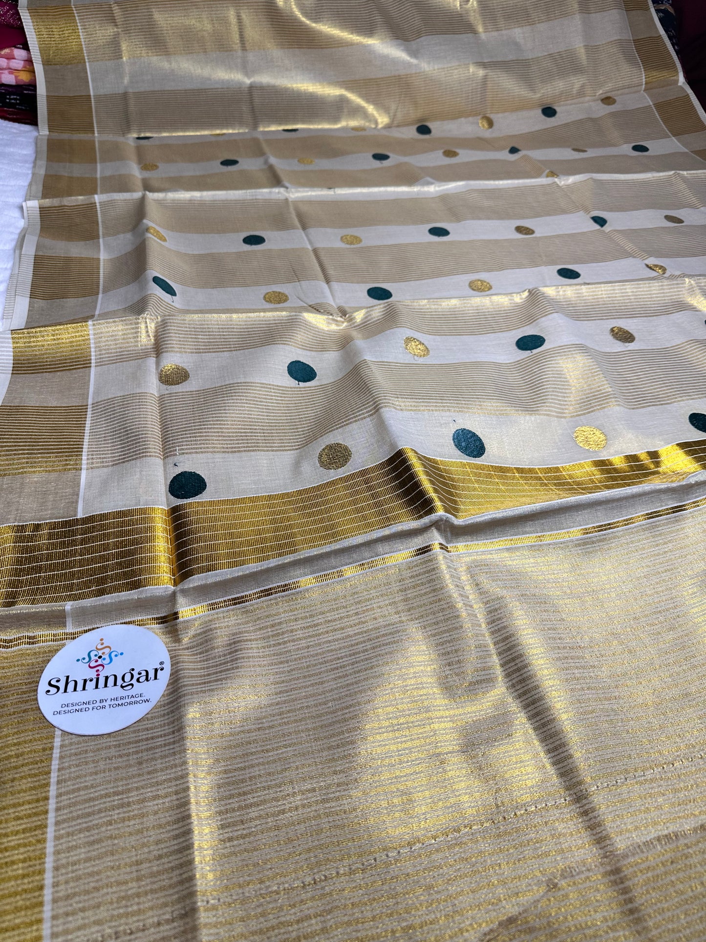 Kerala Onam Tissue Saree ( green polka dots in Pallu)
