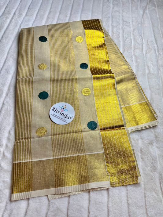 Kerala Onam Tissue Saree ( green polka dots in Pallu)