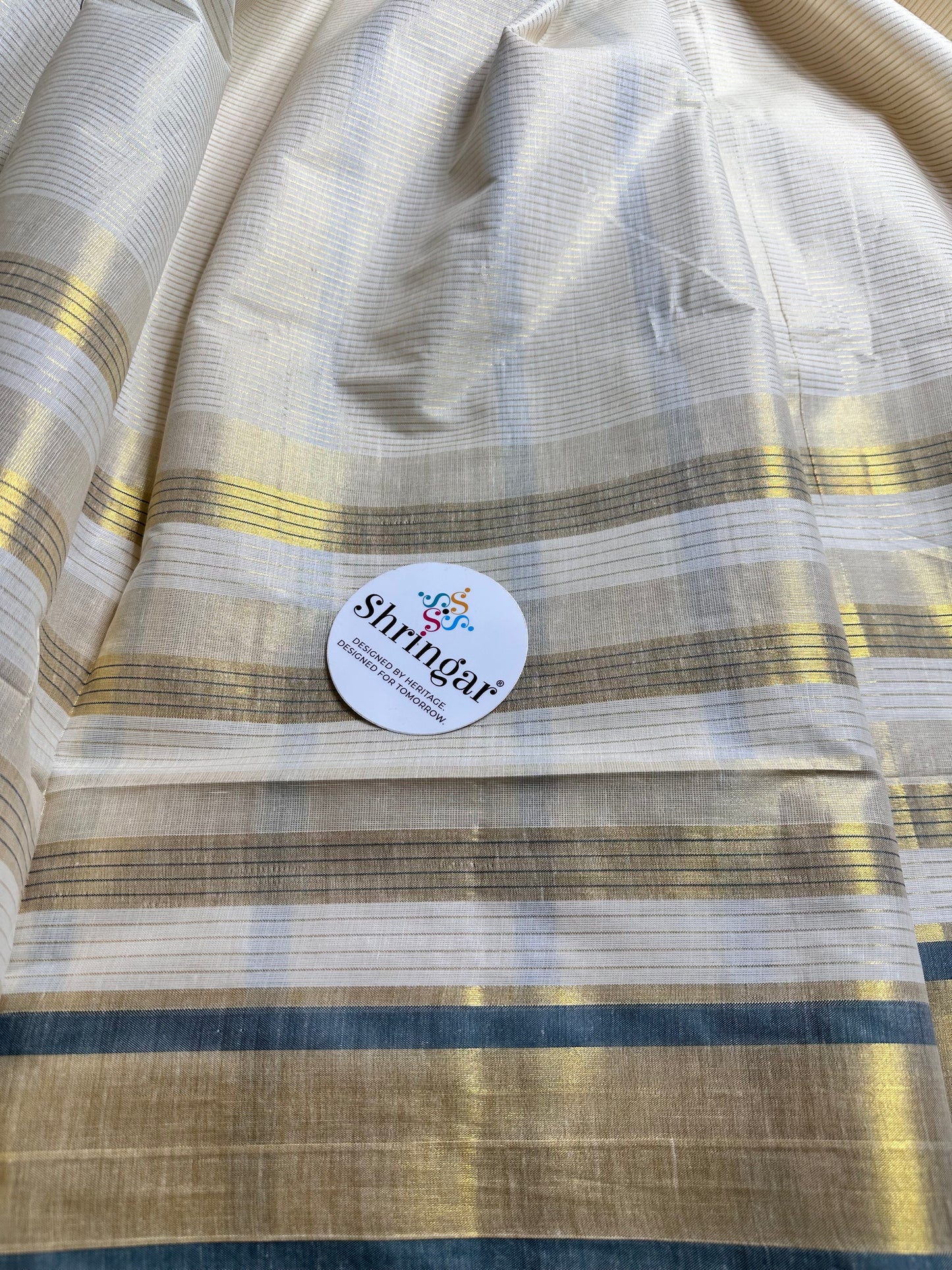 Kerala Saree with gold stripes