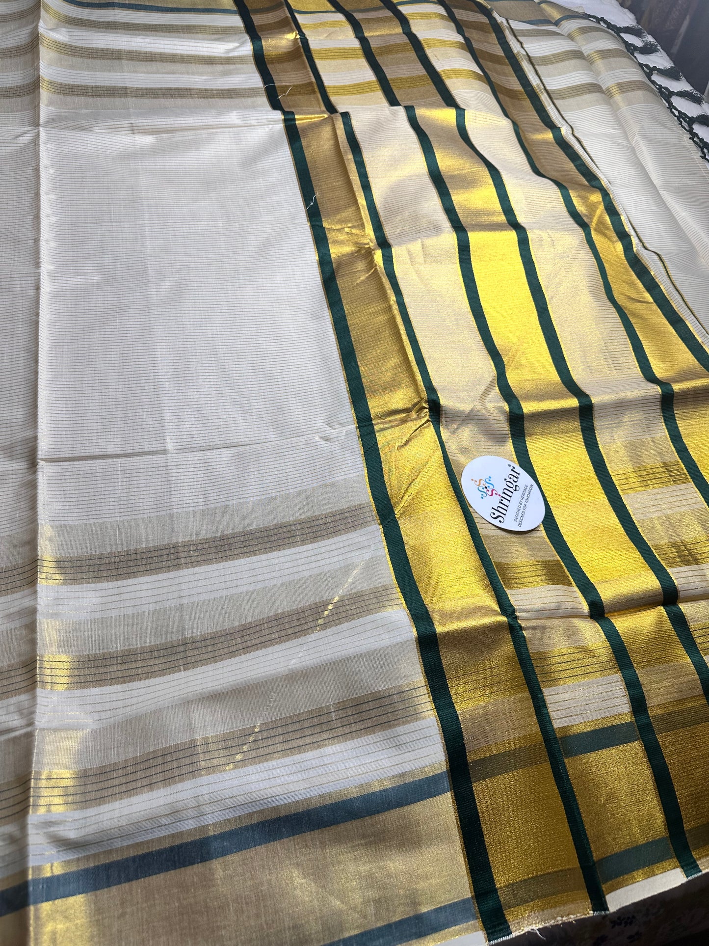 Kerala Saree with gold stripes