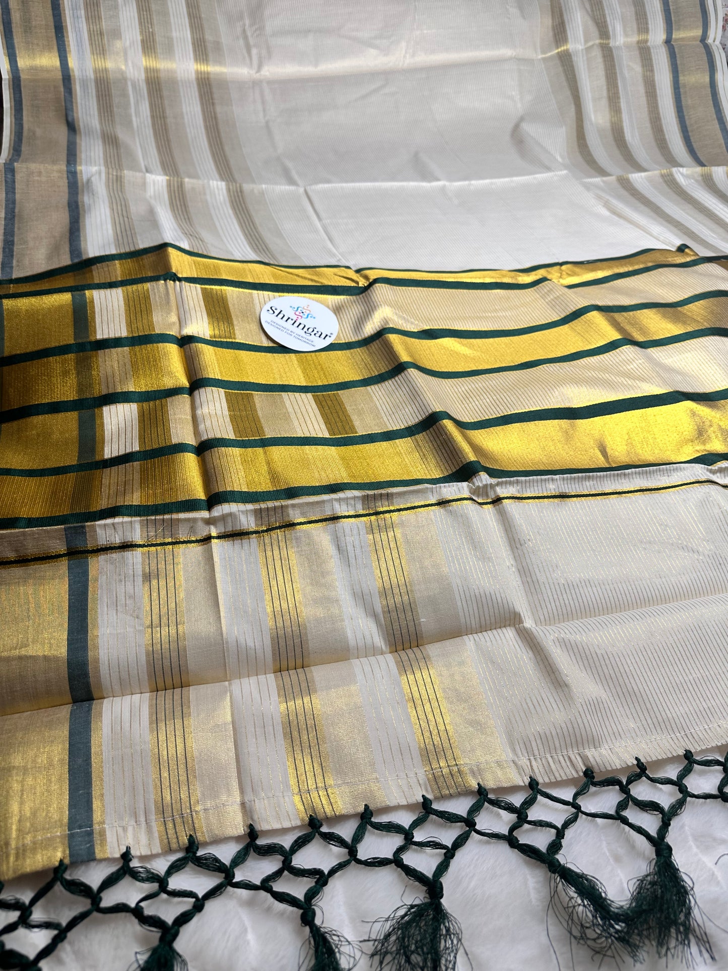 Kerala Saree with gold stripes