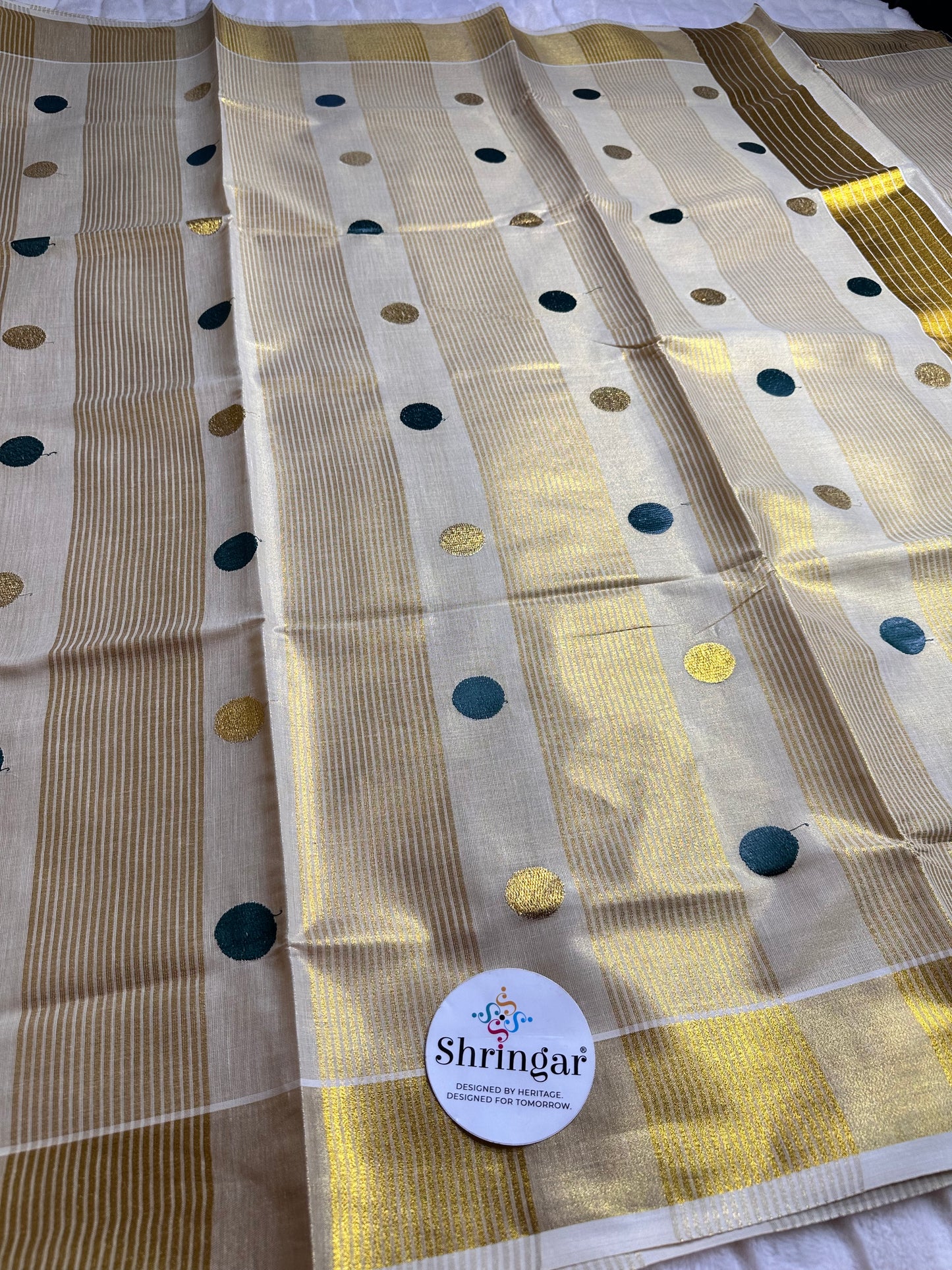 Kerala Onam Tissue Saree ( green polka dots in Pallu)