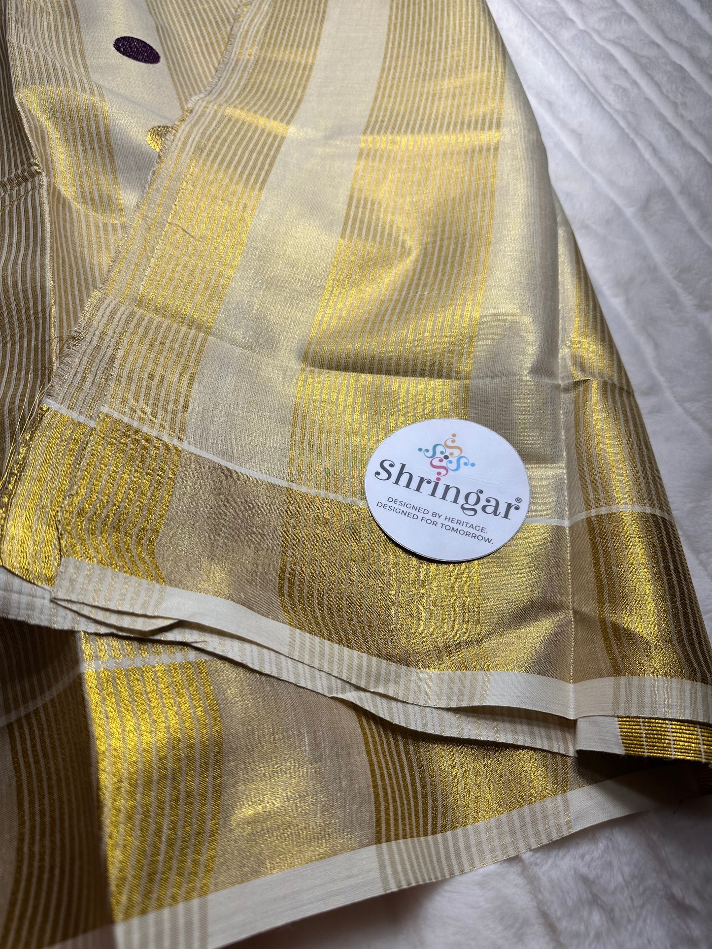Kerala Onam Tissue Saree (purple polka dots in Pallu)