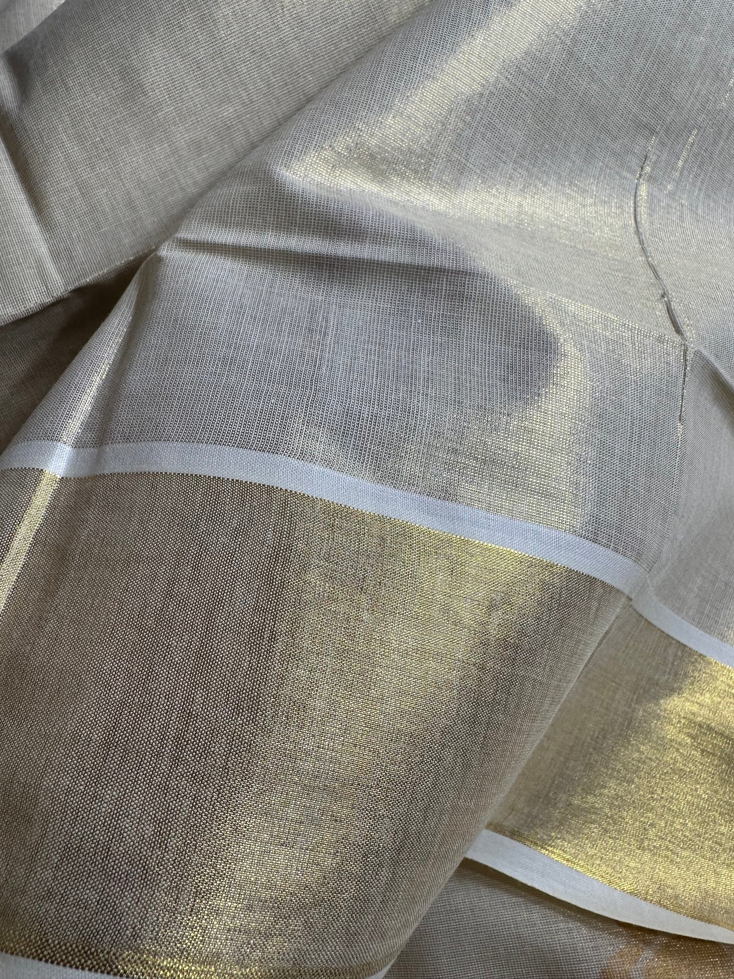 Kerala Saree with blue and gold lotus motifs