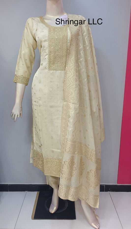Cream Salwar Suit with Golden Colored Designs and Matching Pants and Dupatta