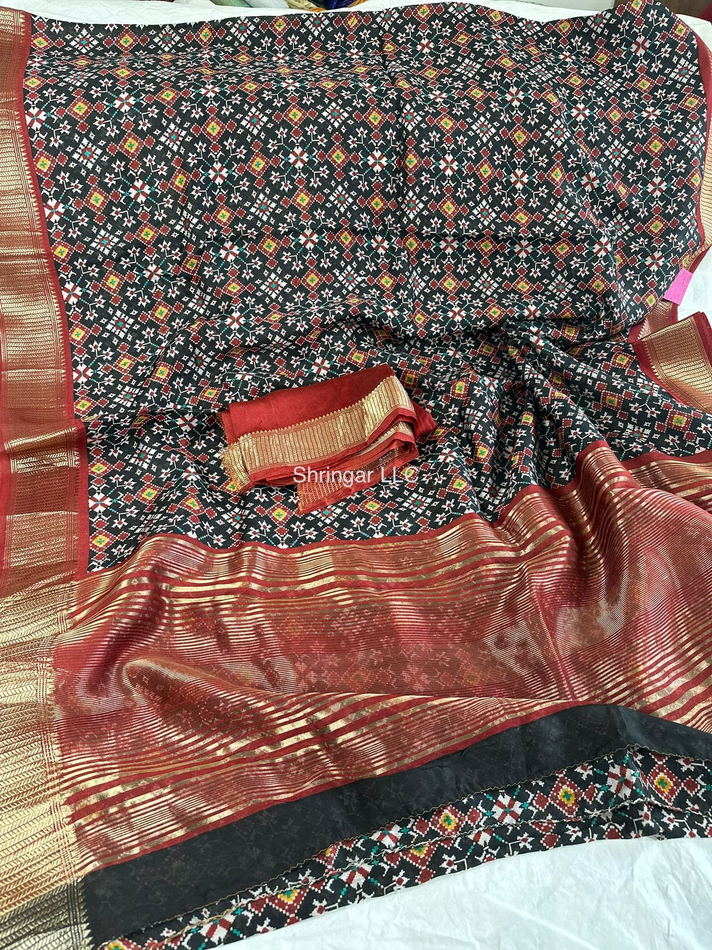 Light weight Binny crepe saree with all over Patola print and jari weaving border and pallu