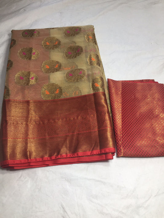 Organza saree with Kanchi border and brocade blouse fabric